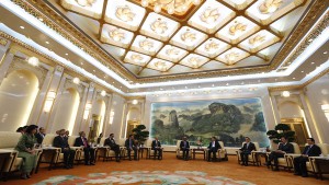 President Xi Jinping, fourth from right, meets with guests in October at the AIIB launch ceremony in the Great Hall of the People, Beijing