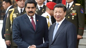 Venezuelan President Nicolas Maduro, left, shakes hands with China's President Xi Jinping. 